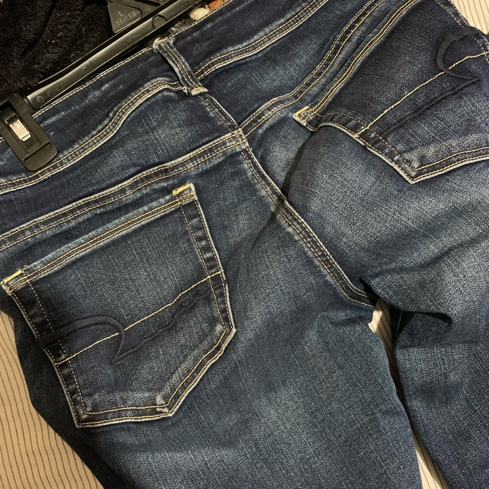 Jeans worn few times, no rips or stains. Super stretch. No fade, dark jeans.
